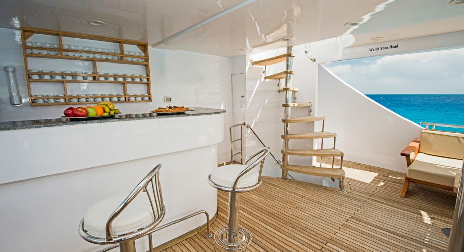 Yacht Deck | YATCO An indoor yacht deck of a luxury yacht sailing in the ocean.