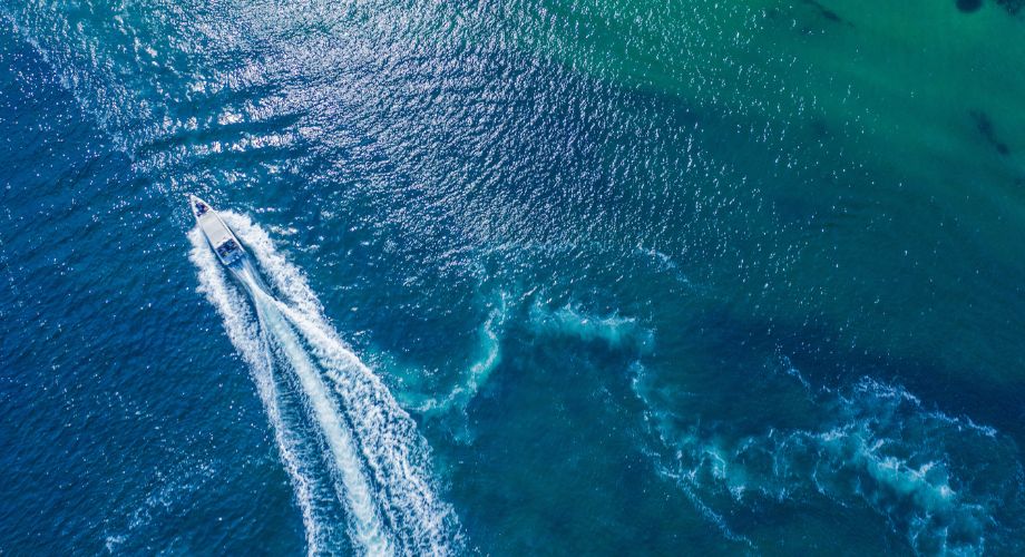 Yacht Sizes | YATCO A luxury yacht sailing in the ocean. Confused about yacht sizes? Discover the right fit for you—from small luxury yachts to superyachts—explore types, prices, and yacht lengths.